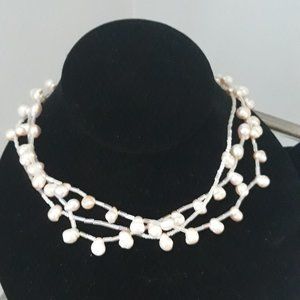 Pale pink pearl choker and earring set.